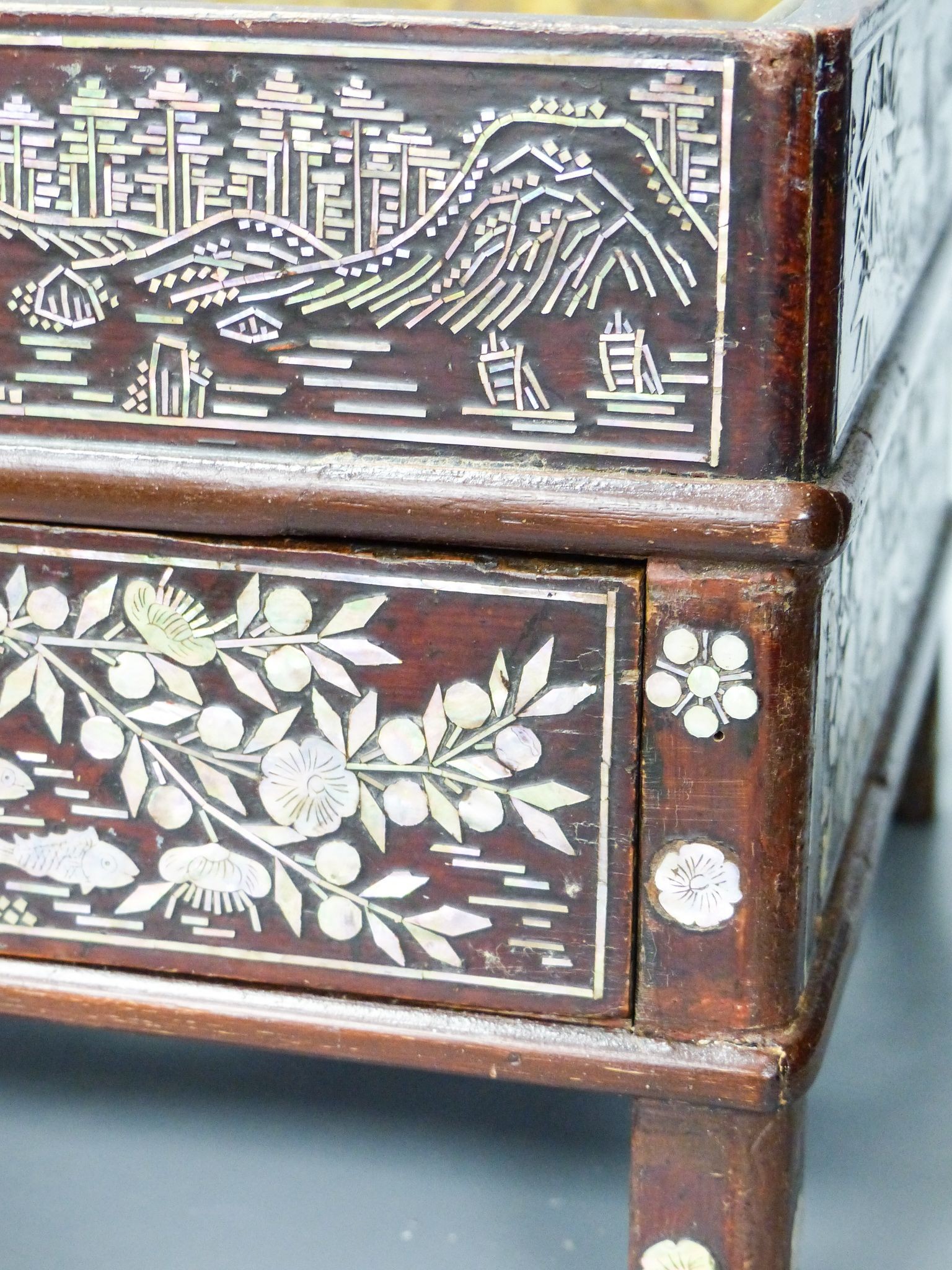 A 19th century Korean lacquered wood stove with mother of pearl inlay 38cm